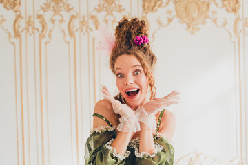 Joyful period-dressed woman expressing excitement in an elegant historic setting