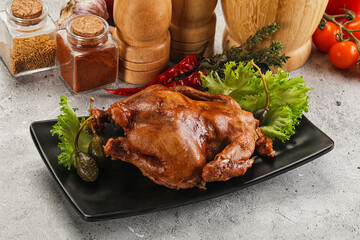 Baked small chicken with spices