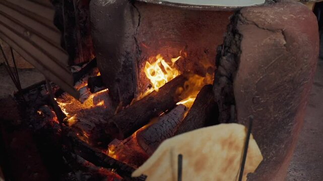 fire in fireplace with yuca bread
