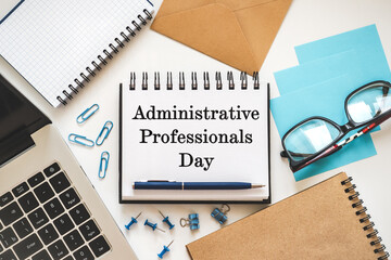 Happy Administrative Professionals Day. Notepad with congratulatory inscriptions. Close-up, view...
