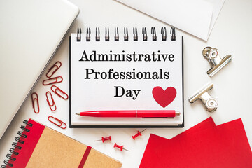 Happy Administrative Professionals Day. Notepad with congratulatory inscriptions. Close-up, view...