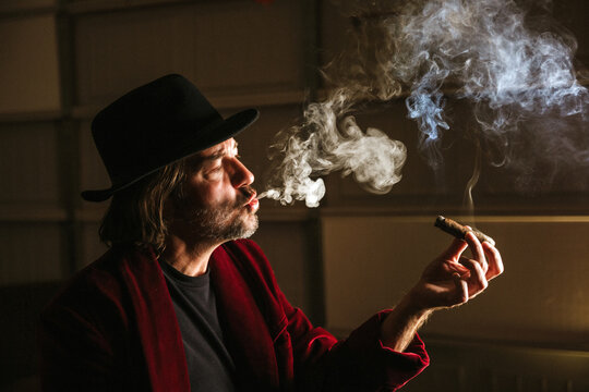 man smoking cigar