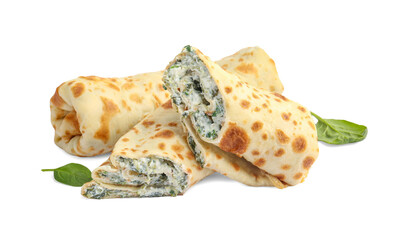 Tasty rolled crepes with cottage cheese and spinach isolated on white