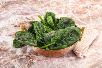 Fresh green spinach leaves heap