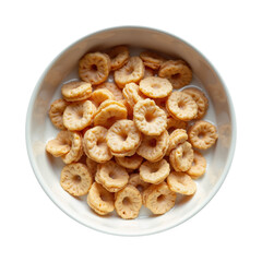 Dried pineapple rings in white bowl on light background