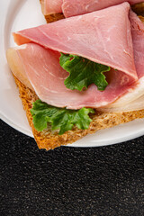 Sandwich ham tasty fresh delicious gourmet food background on table rustic food top view copy space