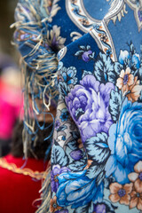 Russian folk pattern on a scarf and flowers