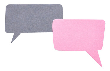 Grey pink blank cut out paper speech bubbles with rough edges and copy space for text on...