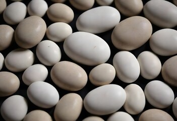 Minimalistic background/backdrop. White round stones / pebbles.