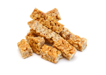 Honey bars with peanuts, sesame and sunflower seeds isolated