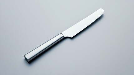 Sleek Silver Pastry Cutter on Gray Background