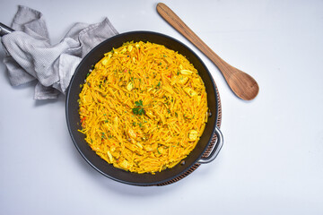 homemade recipe for fideuá in paella, a traditional Spanish dish in 