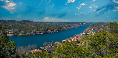 Fototapeta premium Panoramic vista of the Colorado river from Mount Bennell, Austin, Texas, USA
