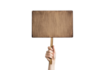 A hand holding a wooden stick sign with a white blank paper for your message or text