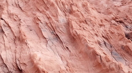 Naklejka premium A stunning pink mountain closeup showcasing vibrant pink hues, rugged texture, and natural rock formations.