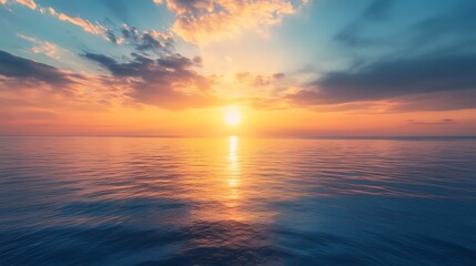 Vibrant sunset over calm ocean waters.