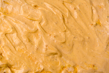 Yellow sauce splashes as a background.