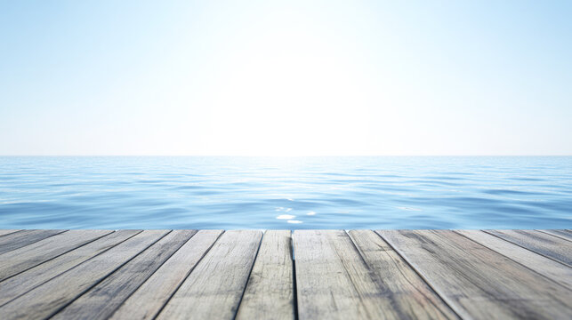 Serene wooden pier overlooking calm ocean under clear sky