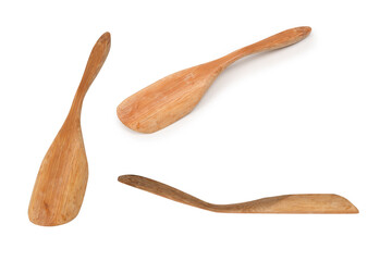 Wooden spatula for spices, tea isolated on a white background.