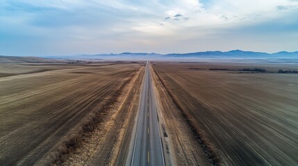 Journey along the straight highway open road aerial view urban landscape overhead perspective