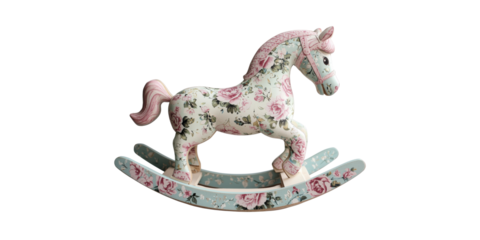 Floral patterned rocking horse toy with pink and blue details isolated on transparent background