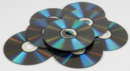 A Pile of Old Scratched CDs and DVDs