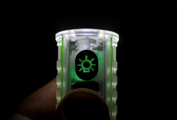 LED flashlight isolated on dark background