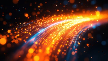 Obraz premium Vibrant Light Trails and Sparkling Particles Creating a Dynamic Flow with Warm Colors and a Dark Background in a Modern Abstract Design