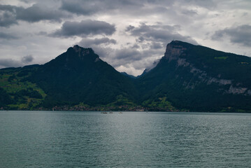 Niederhorn mountain landscape in a cloudy sky, view from Lake Thunersee, Interlaken, Bernese...