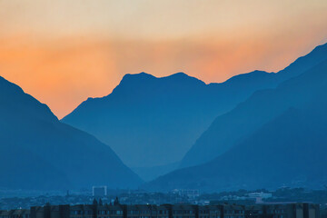 Wailuku mountains seen through hazy atmosphere.