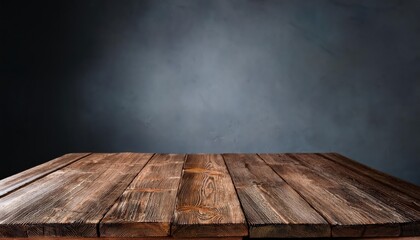 Timeless Rusticity A Dark Wooden Table Stands Out Against a Gloomy Gray Backdrop, Adding Warmth and Texture to the Scene, Perfect for Design Enthusiasts Seeking Cozy, Industrial Chic.
