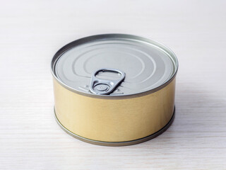 An unopened tin can of tuna fish