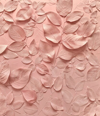 A close-up view of textured, blush pink leaves arranged on a smooth, pastel pink backdrop.