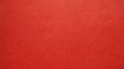 A close-up view of a rich, terracotta-colored textured surface.