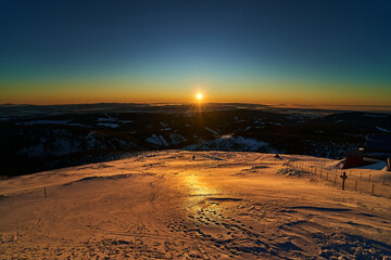 Ultimate sunrise in snowy mountains, epic landscape. Stunning hiking moments