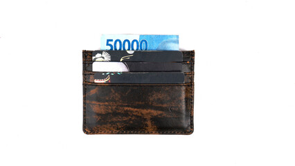 Simple small leather wallet that serves to store a few cards and a little money, isolated on white background