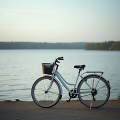 Obraz premium A white bike stands by a rippling lake, clean minimal design with cool hues, great for elegant nature shots.