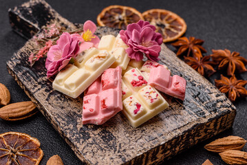 Multicolored handmade chocolate bars pink, white, brown colors