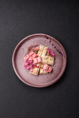Multicolored handmade chocolate bars pink, white, brown colors
