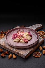 Multicolored handmade chocolate bars pink, white, brown colors