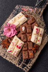Multicolored handmade chocolate bars pink, white, brown colors