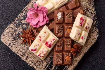 Fototapeta premium Multicolored handmade chocolate bars pink, white, brown colors
