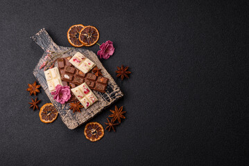 Multicolored handmade chocolate bars pink, white, brown colors