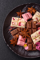Fototapeta premium Multicolored handmade chocolate bars pink, white, brown colors
