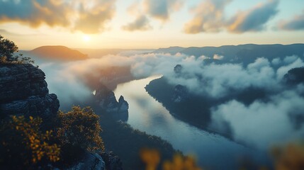 Fototapeta premium Sunrise over misty river valley, dramatic cliffs (1)