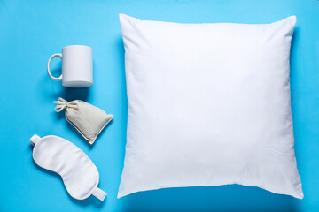 Different blank items for branding on light blue background, flat lay. Mockup for design