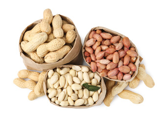 Different peanuts in paper bags isolated on white, top view