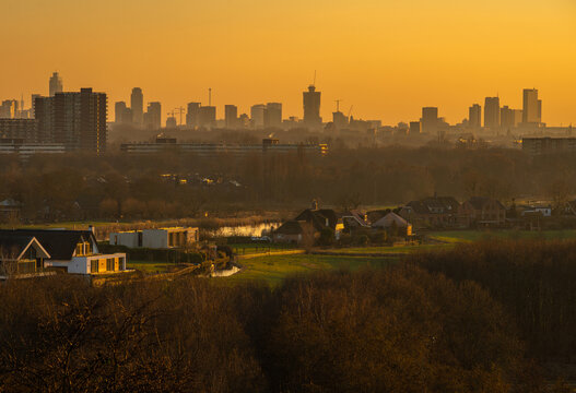 Skyline of Rotterdam by sunset seen from the observation point Lührs in Bergschenhoek