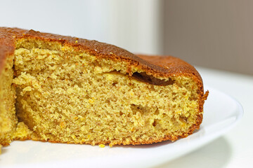 Close-up photograph of a fluffy orange cake
