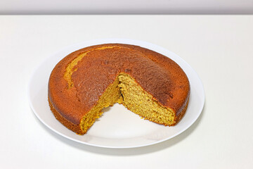 Close-up photograph of a fluffy orange cake